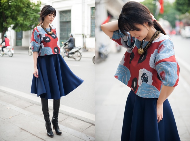 Để tạo nên vẻ tươi trẻ, cô chọn chân váy chữ A dài đến gối, mặc cùng áo lửng có ống tay phồng.